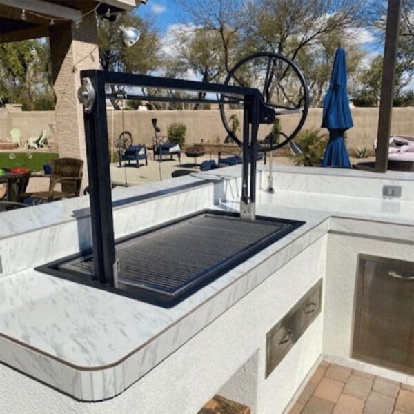 Gaucho grill insert for a bbq island.