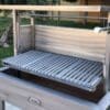 Wind screen for an Argentine grill