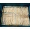 Charcoal grates keep wood elevated to facilitate airflow in a Santa Maria grill.