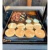 Flat plate griddle to cook on a wood grill