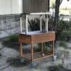 Architectural grill on cart with corten bottom