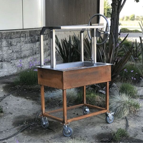 Architectural grill on cart with corten bottom