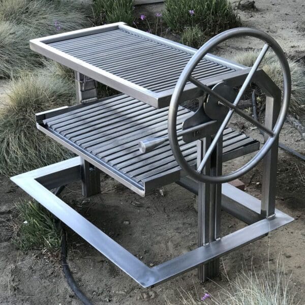 Argentinian Gaucho Grill Frame with V Grate Plates and Rod upper rack in stainless steel.