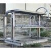 Santa Maria Argentine parrilla style grill with V sloped grate surface in all stainless steel.