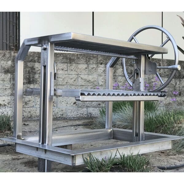 Santa Maria Argentine parrilla style grill with V sloped grate surface in all stainless steel.