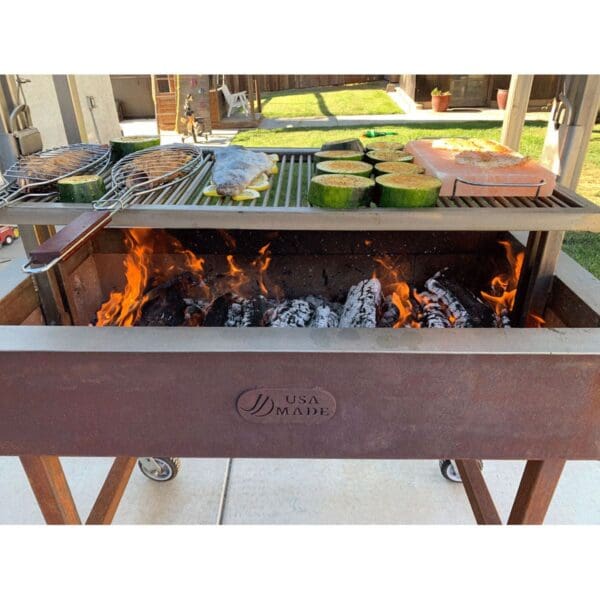 Cooking fish over an open fire on an Argentine grill