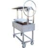 Dual level stainless Gaucho grill on cart