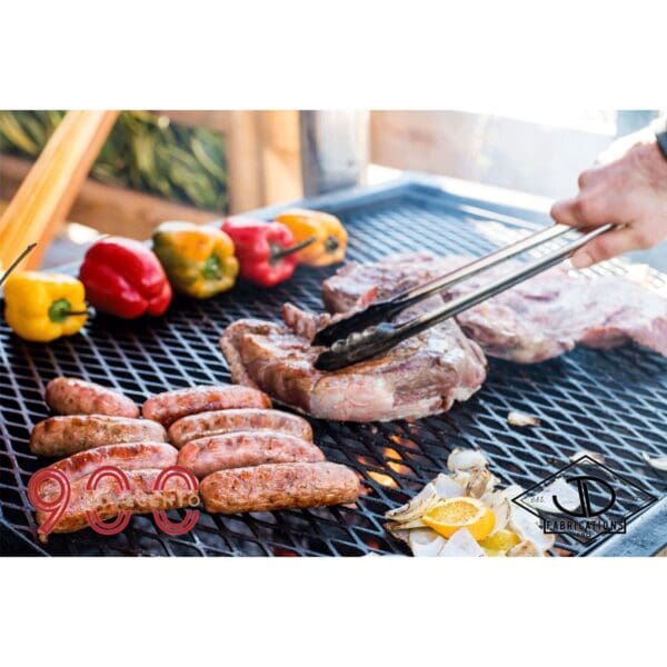 Meat and veggies being cooked on grill