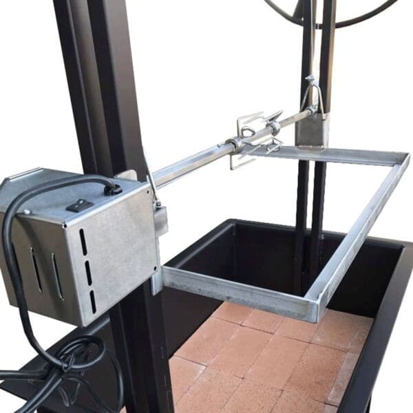 Height adjustable rotisserie on a Santa Maria grill