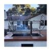 Built in Western style adjustable bbq grill for outdoor live fire cooking