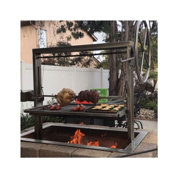 Drop in wood and charcoal grill insert with V channel grates and cable hoist system