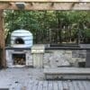 Built in wood and charcoal grill that is fully assembled.