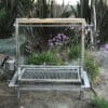 Argentinian style wood fired parrilla with rotisserie and stainless construction