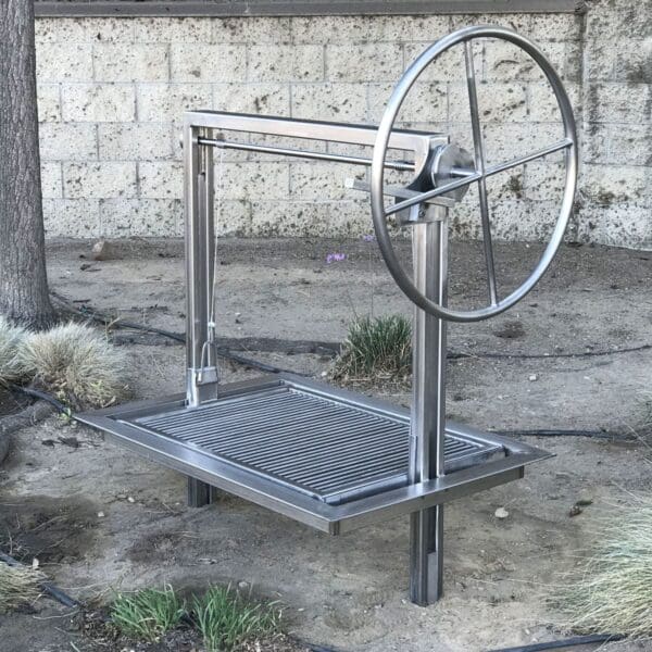 Outdoor kitchen insert with Argentine grill design