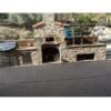 Built in Gaucho grill installed into an outdoor kitchen island