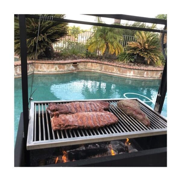 Residential grill for wood or charcoal