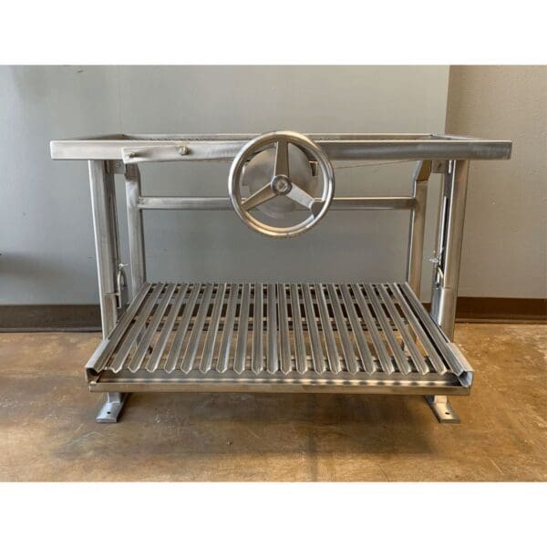 Stainless grill frame with adjustable grate and front wheel