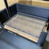 Charcoal grates are used to elevate the fuel and facilitate airflow.