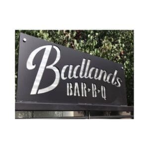 Custom signs can be added to a bbq grill to advertise.