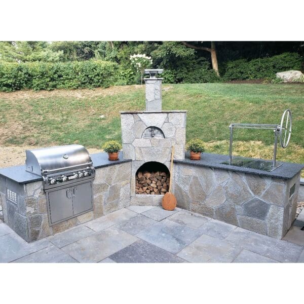 All stainless charcoal grill insert for an outdoor kitchen island.