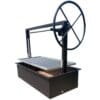 Santa Maria style drop in firebox grill with large hand wheel.