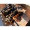 A log lighter on the bottom of the firebox helps to ignite the wood or charcoal more quickly. This aids in faster cooking.