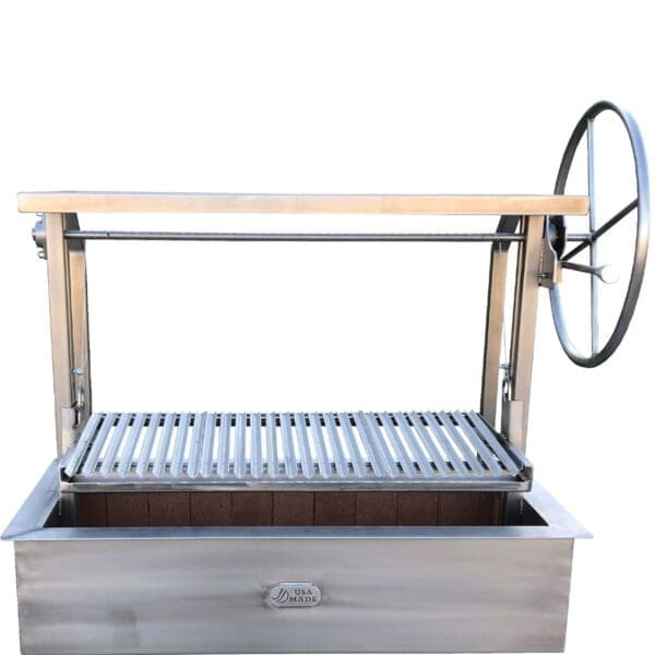 Dual rack Gaucho grill with large hand wheel and adjustable grid.