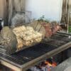 Rotisserie kit for a wood or charcoal grill.